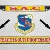 Air Force S. A. C With Motto Metal License Plate Frame In Yellow And Red Licensed Military Apparel Patriotic Products Gifts For Veterans Families And Retired VetFriends.com